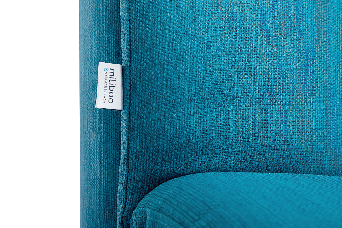 D�tail du tissu bleu canard du canap� convertible scandinave SENSO avec �tiquette