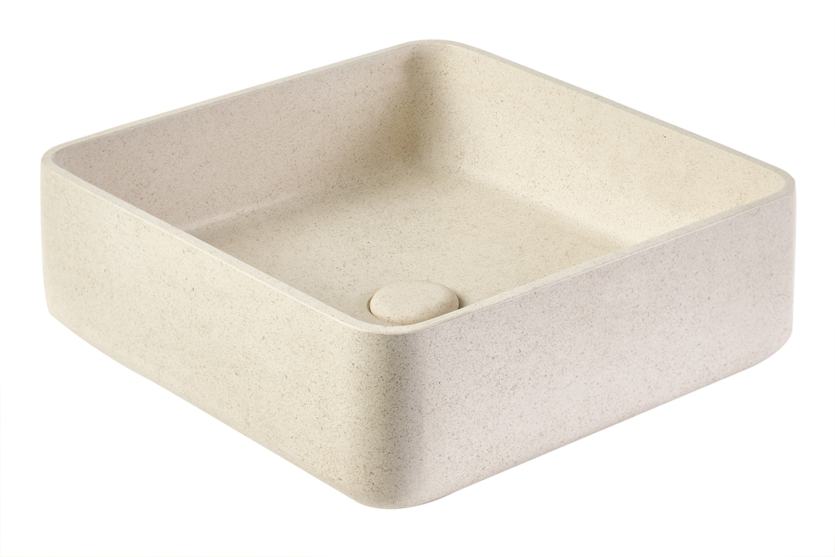 Vasque carr�e en pierre naturelle beige, vue de 3/4, finition mate.